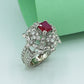 Ladies ring Silver 925 ladies ring  Rhodium plated Studded with zircons and ruby in the Centr