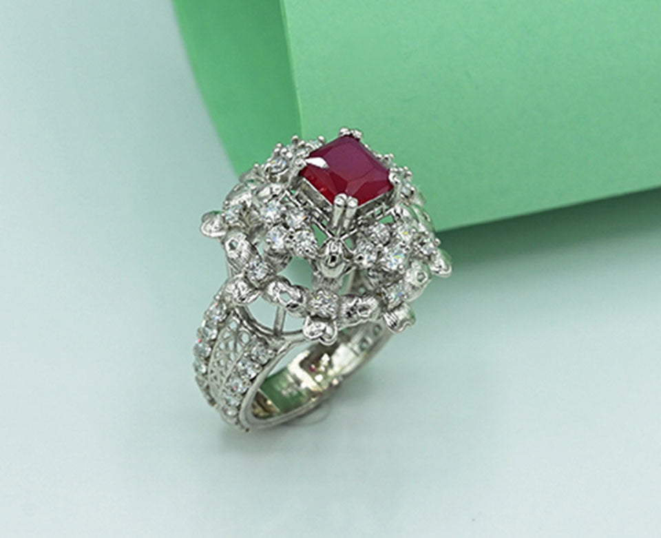 Ladies ring Silver 925 ladies ring  Rhodium plated Studded with zircons and ruby in the Centr