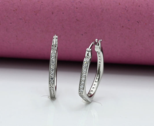 Ear rings Sterling silver 925 earrings for ladies Studded with zircons Rhodium plated