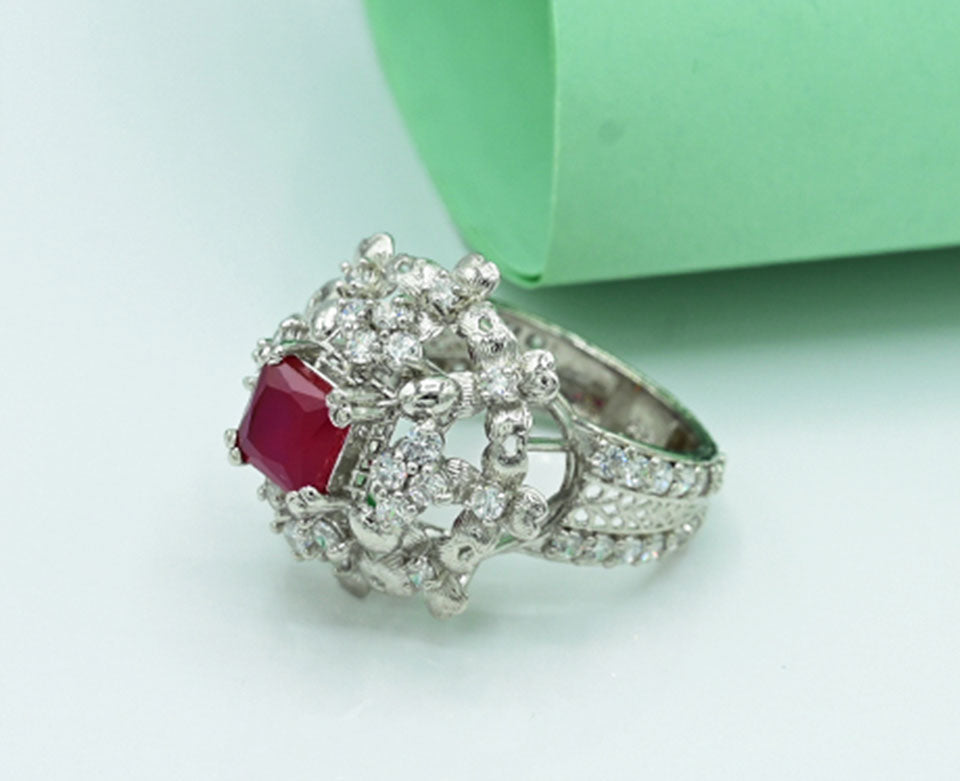 Ladies ring Silver 925 ladies ring  Rhodium plated Studded with zircons and ruby in the Centr